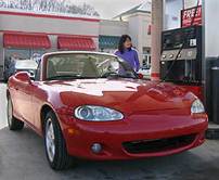 Woman at fuel pump